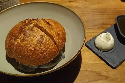 Wholemeal Sourdough Bread, Smoked butter with sherry and apple and Olive Oil from the Duero valley - Alma, Lisbon (52740671865) — illustrative photo