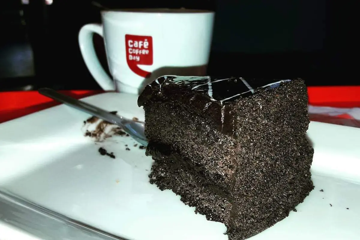 Pastry & coffee served at Café Coffee Day — illustrative photo