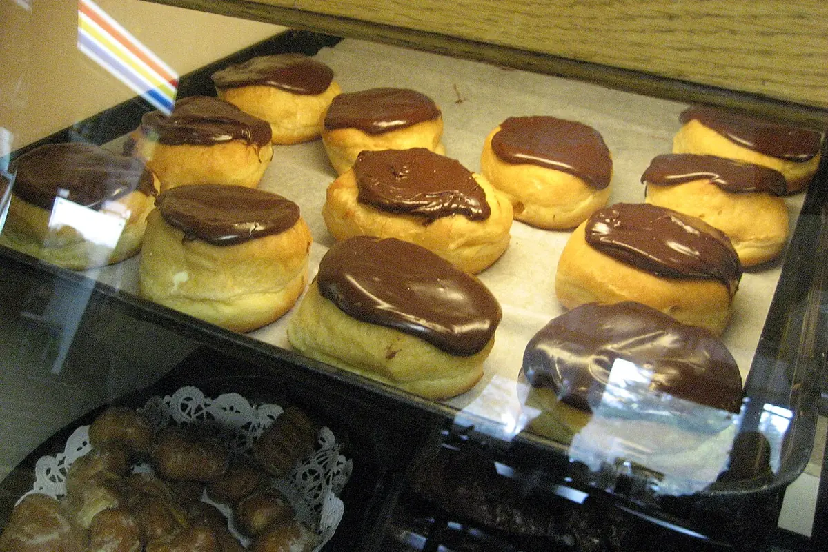 Boston cream doughnuts in display case, November 2007 — illustrative photo